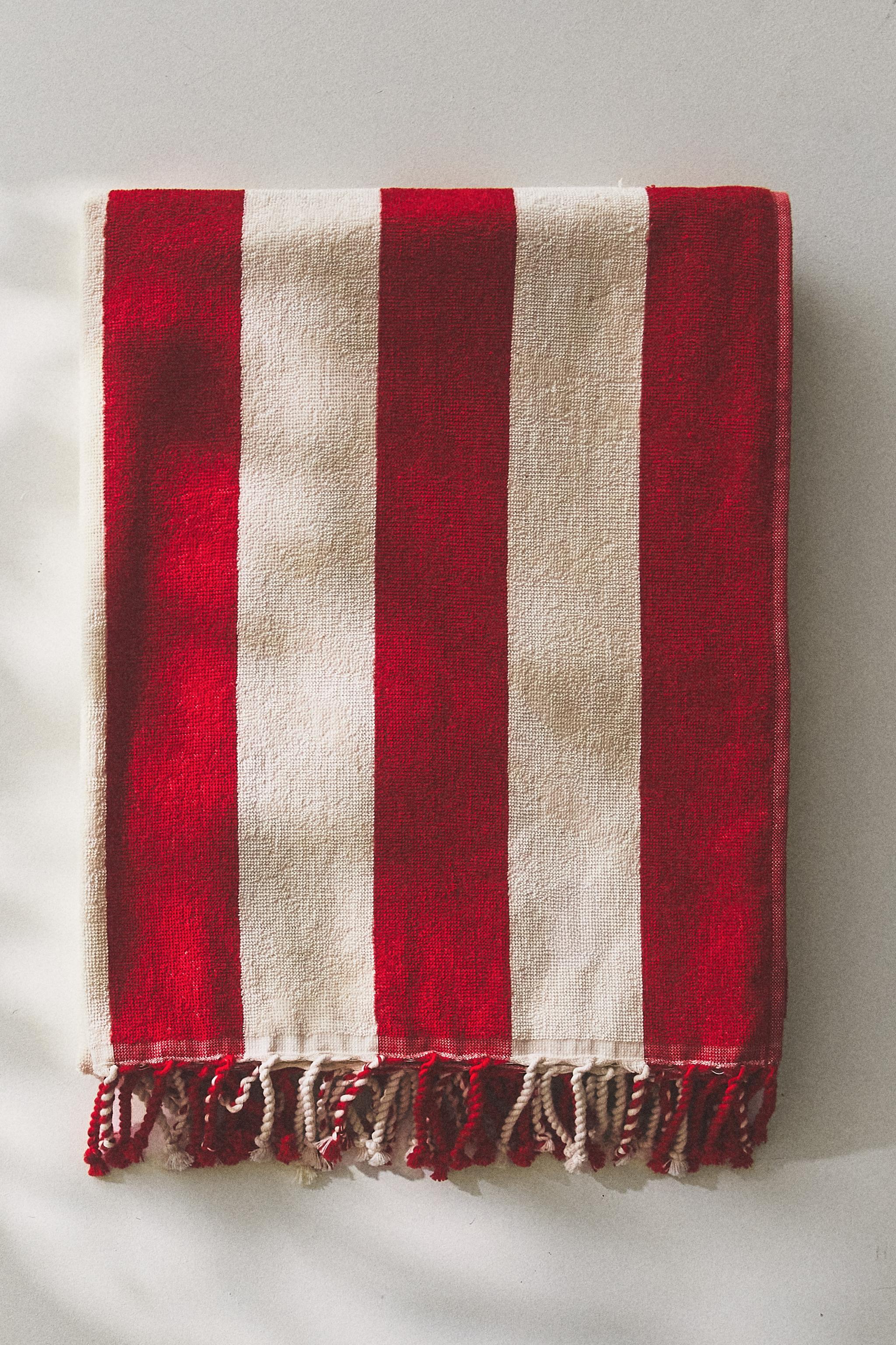 STRIPED BEACH TOWEL WITH FRINGE